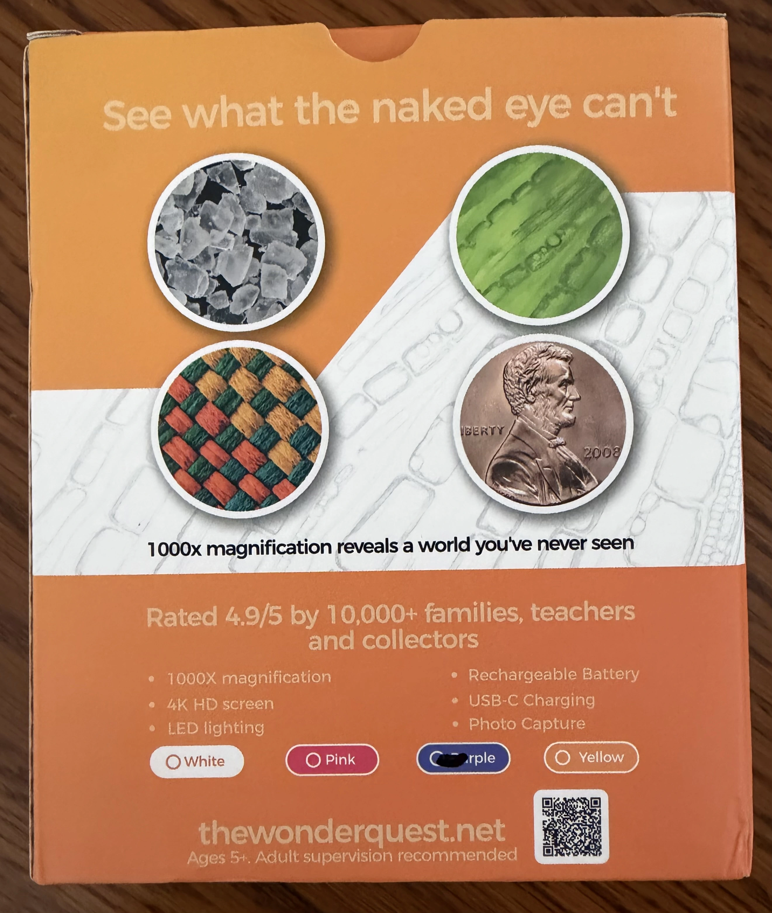 Back of the WonderQuest box listing 1000X magnification, 4K HD screen, LED lighting, rechargeable battery and USB-C charging