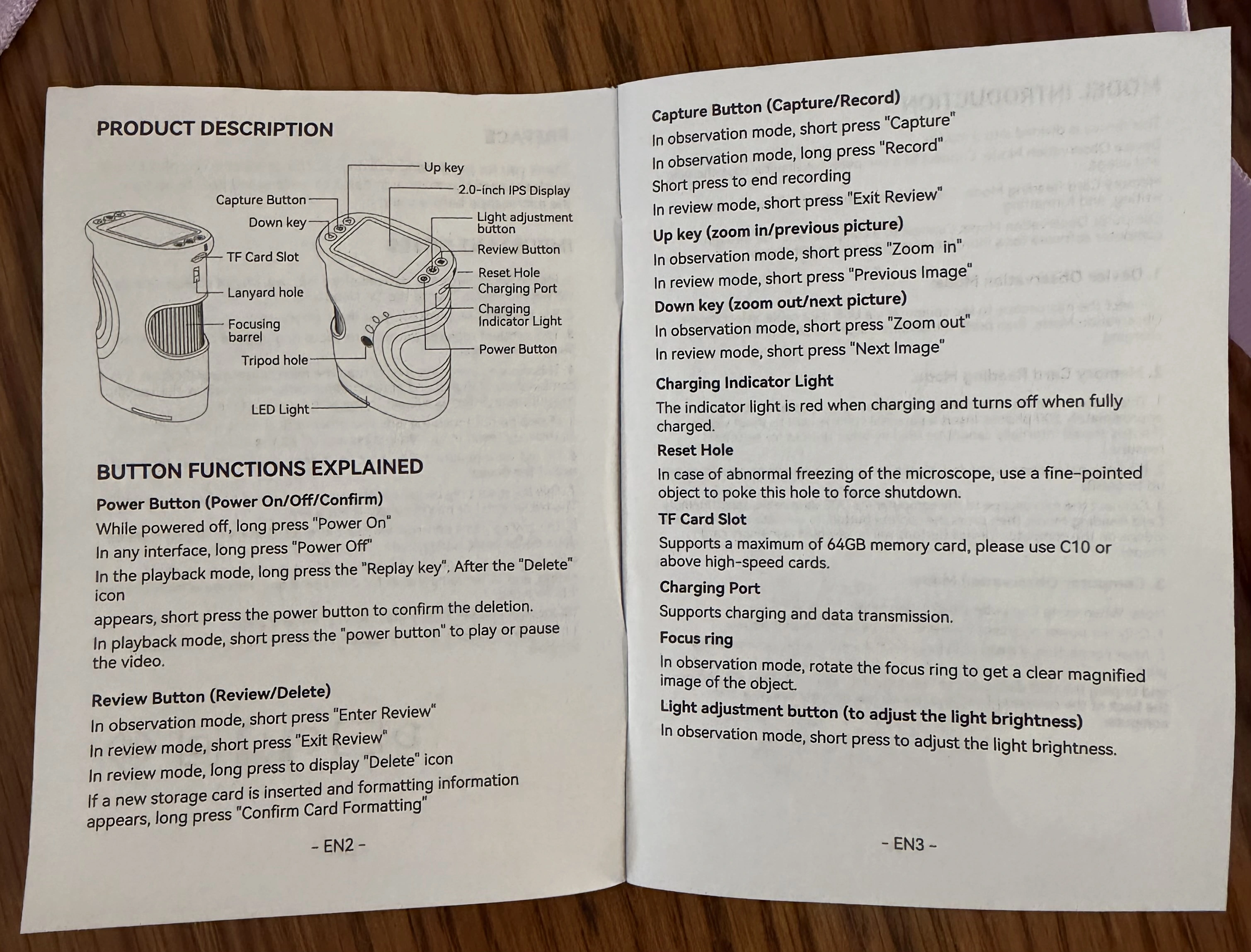 WonderQuest user manual open to the product description and button functions pages